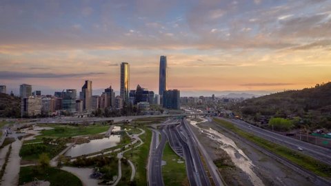 Santiago of Chile, view of the bicentennial park and some of its emblematic buildings in a timelapse hyperlapse shortly after sunset