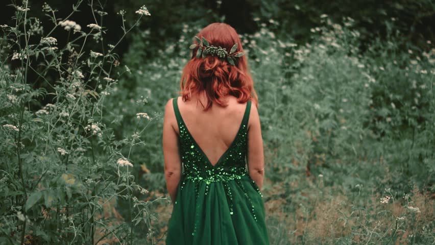 red hair and green dress