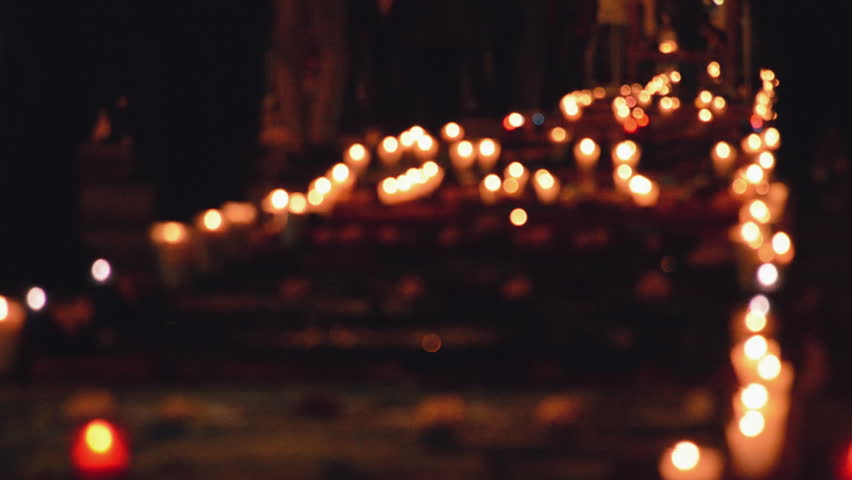 Crowd of people on a path of candles during the day of the death festival, (Día de los muertos) Royalty-Free Stock Footage #1016773897