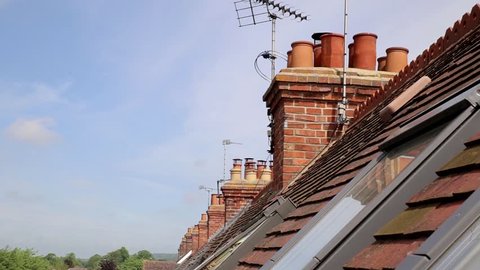 Row of Victorian chimneys with TV aerials