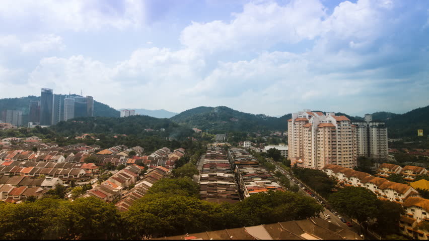 Clear day HD timelapse of hilly/city area in Kuala Lumpur, Malaysia