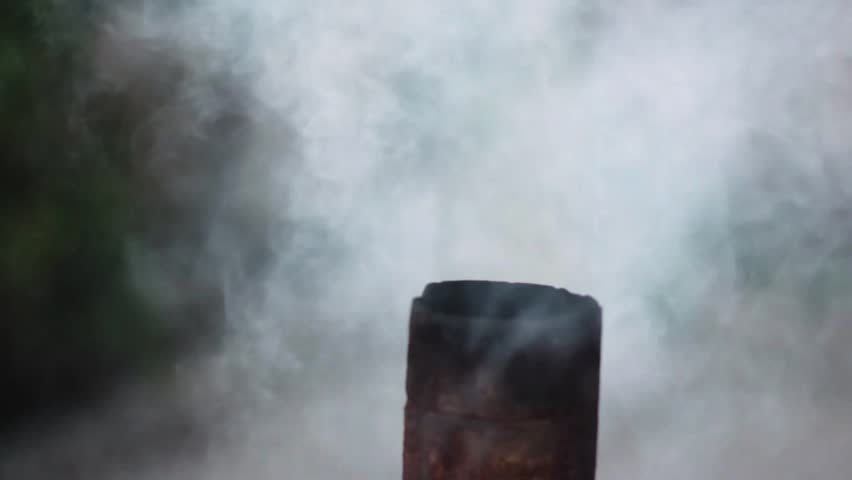 Smoking samovar (tea-urn) - boiling water by burning wood.