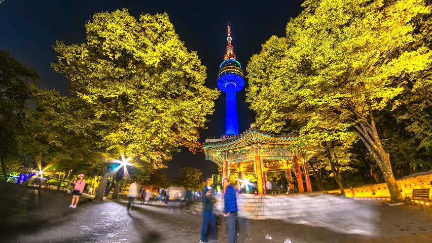4K, Time lapse view of Seoul Tower in autumn at Night landmark of Seoul city South Korea