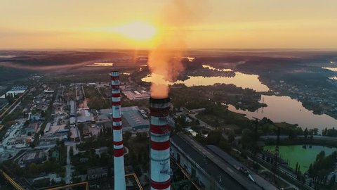 Aerial drone footage. Coal fire power station at sunset.