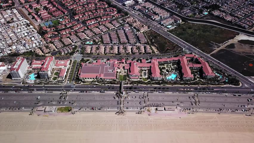 4K Drone Aerial of Huntington Beaches looking down Hotel Row on Main Street
Drone Aerial of Huntington Beaches looking down Hotel Row on Main Street
Aerial flyover and looking down on the beaches and 