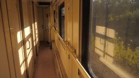 Interior of train railroad car sunlight compartment with night corridor before departure. slow motion video. Corridor of the compartment car lifestyle of the new train. train rail car from inside - Powered by Shutterstock - Get 15% off with code: PIKWIZARD15