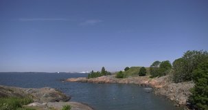 4K summer morning video of Helsinki Baltic Sea Finnish Bay lagoon area, old forts skyline, Suomenlinna Island with fortifications and cannons near the capital of Finland Suomi, northern Europe