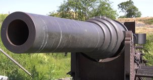 4K high quality summer morning video of Helsinki's Suomenlinna Island, brick fort building, old genuine Russian cannon in front of it near King's Gate tower in Finland Suomi, northern Europe