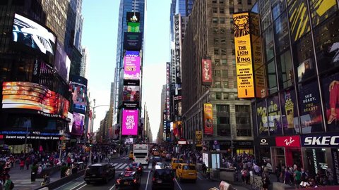 
NEW YORK CITY, USA - SEPT 10, 2018: Aerial low angle drone shot of Times Square advertisement billboards skyscrapers in NYC  . NYC is a popular tourist travel destination.