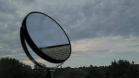 Mirror Reflecting The Clouds Flying By - Powered by Shutterstock - Get 15% off with code: PIKWIZARD15