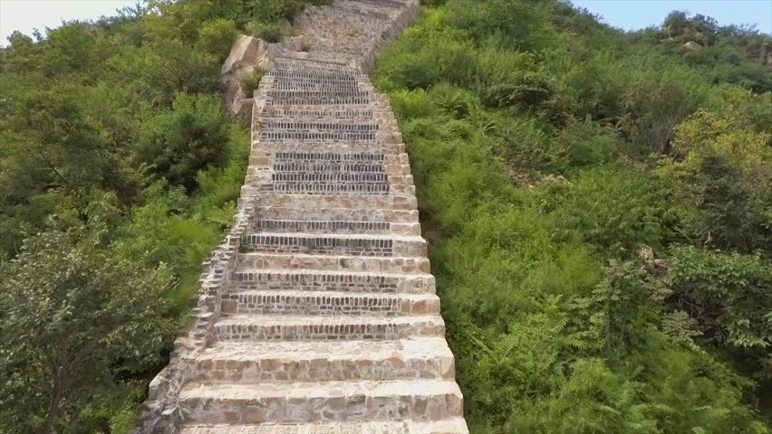 AERIAL: Remote Hike on the Great Wall in China on a sunny day | Shutterstock HD Video #1016840617
