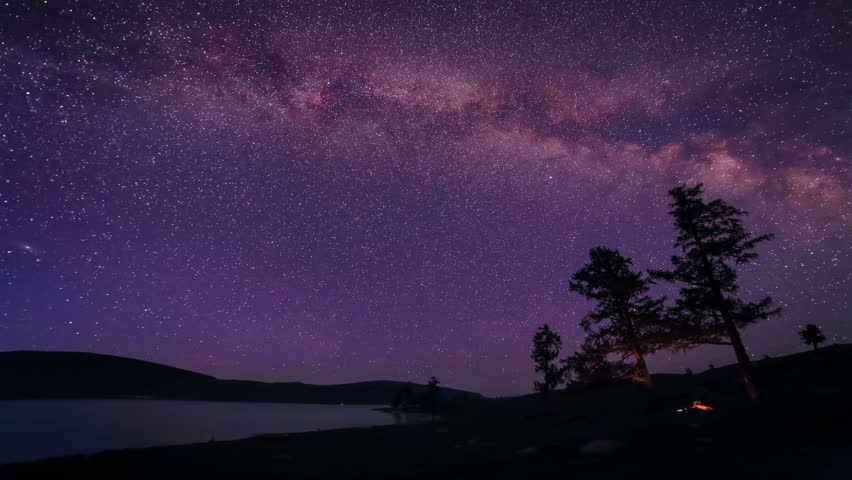 Starry Night over the clouds over the lake Khoton Nuur, Mongolia. Full HD