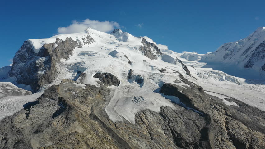 Aerial view of the Monte Rosa Alps with the Dufourspitze, the highest mountain Switzerland. Footage recording from Gornergrat, Zermatt