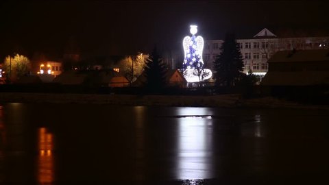 Time Lapse Of Christmas Tree Reflection In The Water At Night