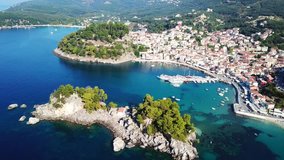 Aerial drone bird's eye view video of iconic and picturesque small island of Panagia and fishing village of Parga, Epirus, Ionian, Greece
