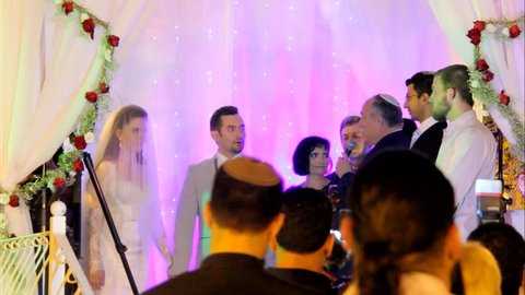 Tel Aviv, Israel - June 29, 2016: Jewish traditions wedding ceremony under chuppah