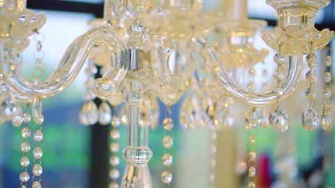 expensive crystal candlestick in a restaurant, close-up, camera moves around