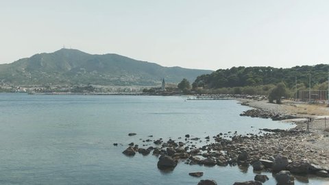 Mytilene, Greece - 08 20 2018: Mytilene Island coastal beach mountains