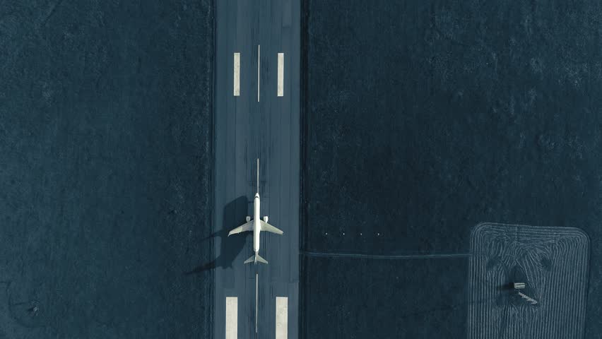 Aerial view of the airplane on take-off approach at the airport runway. top view | Shutterstock HD Video #1016911681