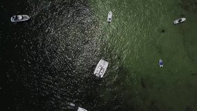 Aerial video - Dolly in towards one boat