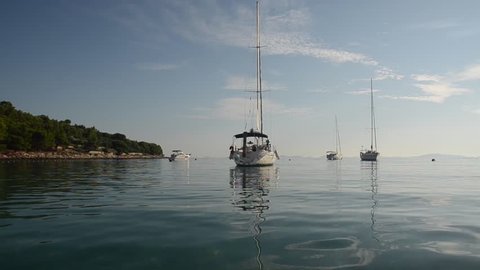 Island of Murter in Adriatic sea. Yachts and boats in a bay. Cigrada Beach. Colorful seascape. Dalmatian Coast, Croatia 