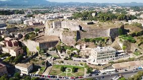 Aerial drone video of iconic new Venetian fortress built on the hill of St. Mark in old town of Corfu , Kerkyra island, Greece