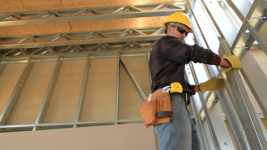 Construction Site and the Caucasian Contractor Worker., an Industrial Video by Virrage Images