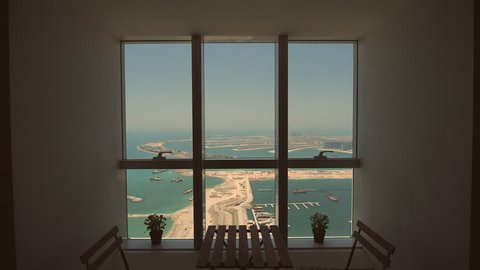 View from the window to the Palm Jumeirah in Dubai. Shooting in motion.