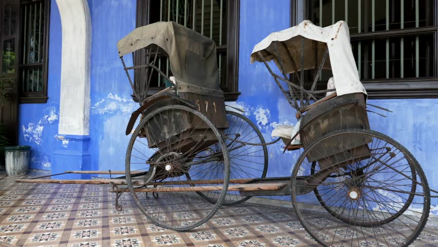 old traditional human pulled trishaw.