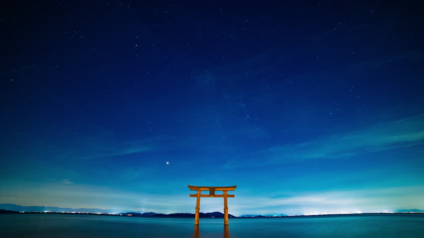 Takashima-ward, Shiga / Japan - 08.07.2018 : It’s a Japanese shrine gate in Biwa lake in Shiga Japan. 4K & time lapse. camera : Canon EOS 5D mark4