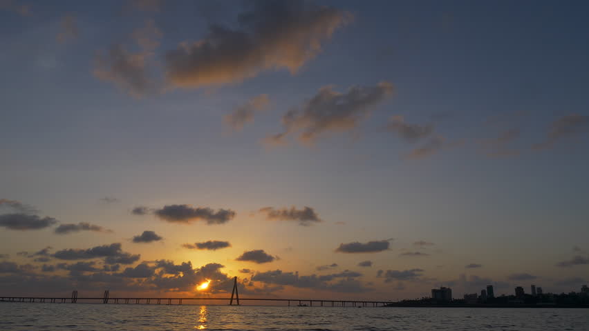Time lapse footage of Sunset at Bandra Worli sea link also known as Rajiv Gandhi Sea link, Mumbai, India.