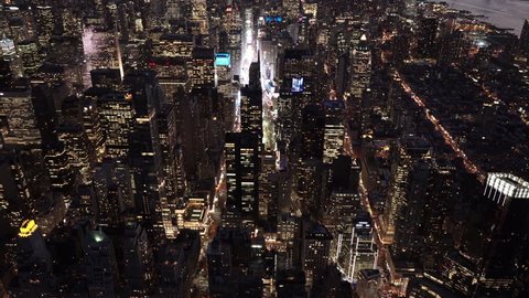 New York City Circa-2015, night aerial view tilting up from Columbus Circle featuring Midtown and Downtown Manhattan Skyline
