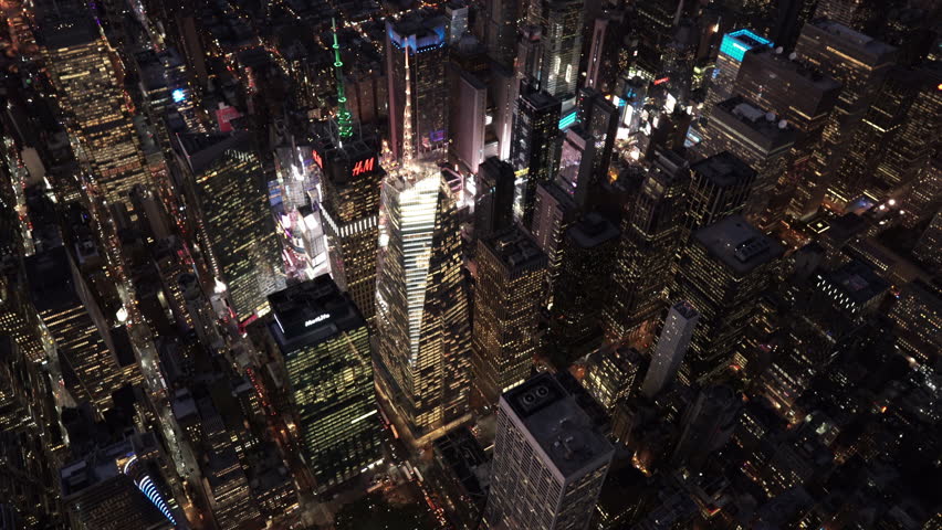 New York City Circa-2015, high angle aerial view of 42nd Street and 5th Avenue at night with Times Square in background