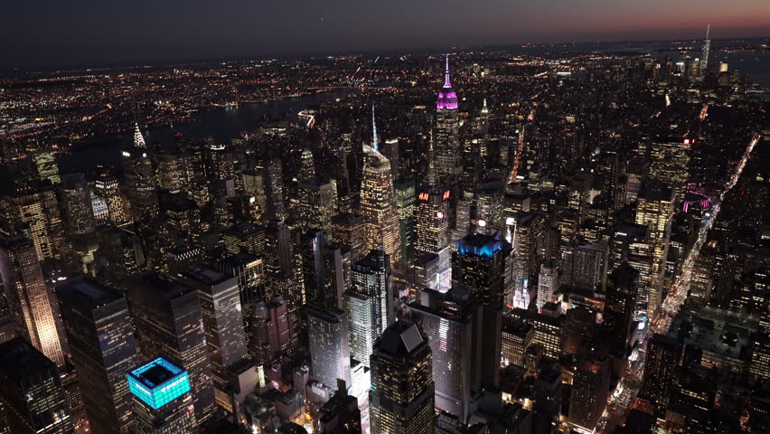 New York City Circa-2015, aerial view of Midtown and Lower Manhattan at night, from 8th Ave by Times Square Royalty-Free Stock Footage #1016996875