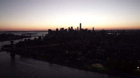 New York City Circa-2015, aerial view of Lower Manhattan at dusk from the East River, by the Williamsburg Bridge