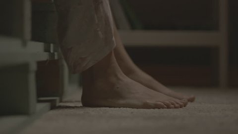Feet of a woman stepping out from bed and walking , 3840x2160 shot with alexa mini