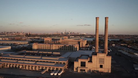 New York City Circa-2015, Aerial view of New York skyline from Passaic River in Newark, New Jersey with a factory in foreground
