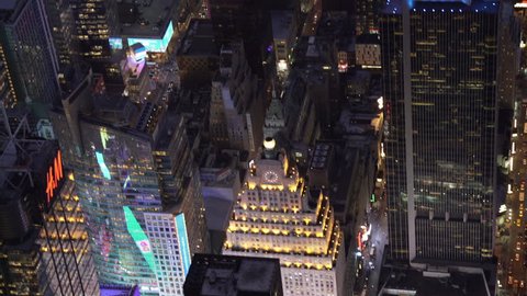 New York City Circa-2015, telephoto aerial view above Times Square and Midtown Manhattan office buildings at night