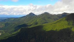 Washington State USA mountain range with low clouds