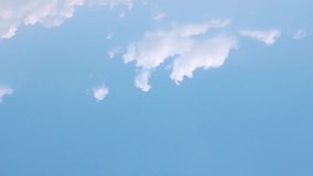 Beautiful blue skies, white time lapse clouds rolling in horizon, fluffy, puffy cloudscape panoramic aerial view, fast motion, clean nice sky.