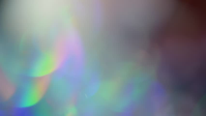 Holographic foil looped footage. Multicolored background. in light neon colors | Shutterstock HD Video #1017012595