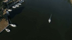 Aerial top view of a sailing yacht regatta. Flying over boats. 4k video
