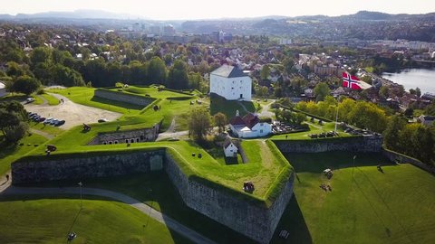 Aerial Capture of the Ancient Fortress in Trondheim, Norway - Sunny Summer Day with an overview of the city