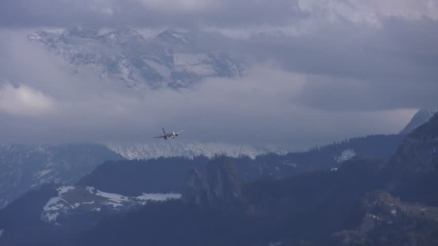 Aircraft Landing Approach in front of Mountains at Salzburg Airport 4K