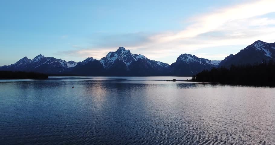 Sunset over Grand Teton Mountain Range and Jackson Lake - Teton, Wyoming