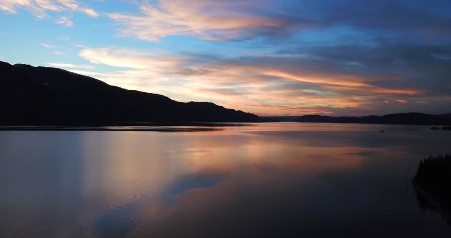 Sunset over Grand Teton Mountain Range and Jackson Lake - Teton, Wyoming