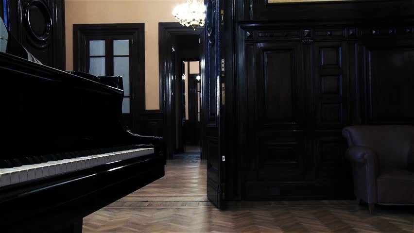 A Grand Piano in an Old Fashioned Room. Close Up. Royalty-Free Stock Footage #1017045565