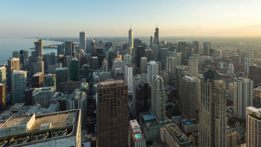 Downtown Chicago Aerial Day to Night Sunset Timelapse