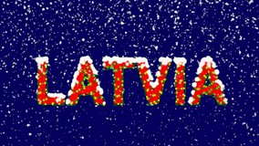 New Year text country name LATVIA. Snow falls. Christmas mood, looped video. Alpha channel Premultiplied - Matted with deep blue RGB(04:00:5B)