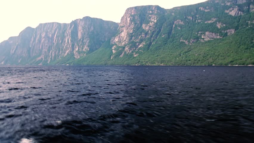 The Tall Beautiful Rock Cliffs In Western Brook Pond Gros Morne
